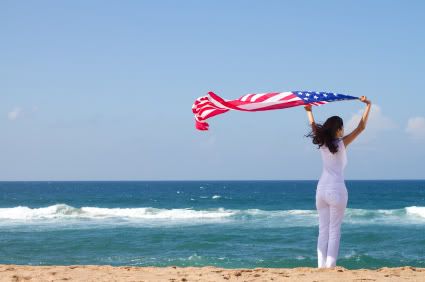 woman a beach with American flag