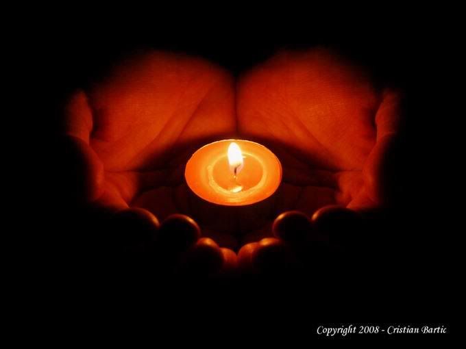 A candle in the dark Pictures, Images and Photos